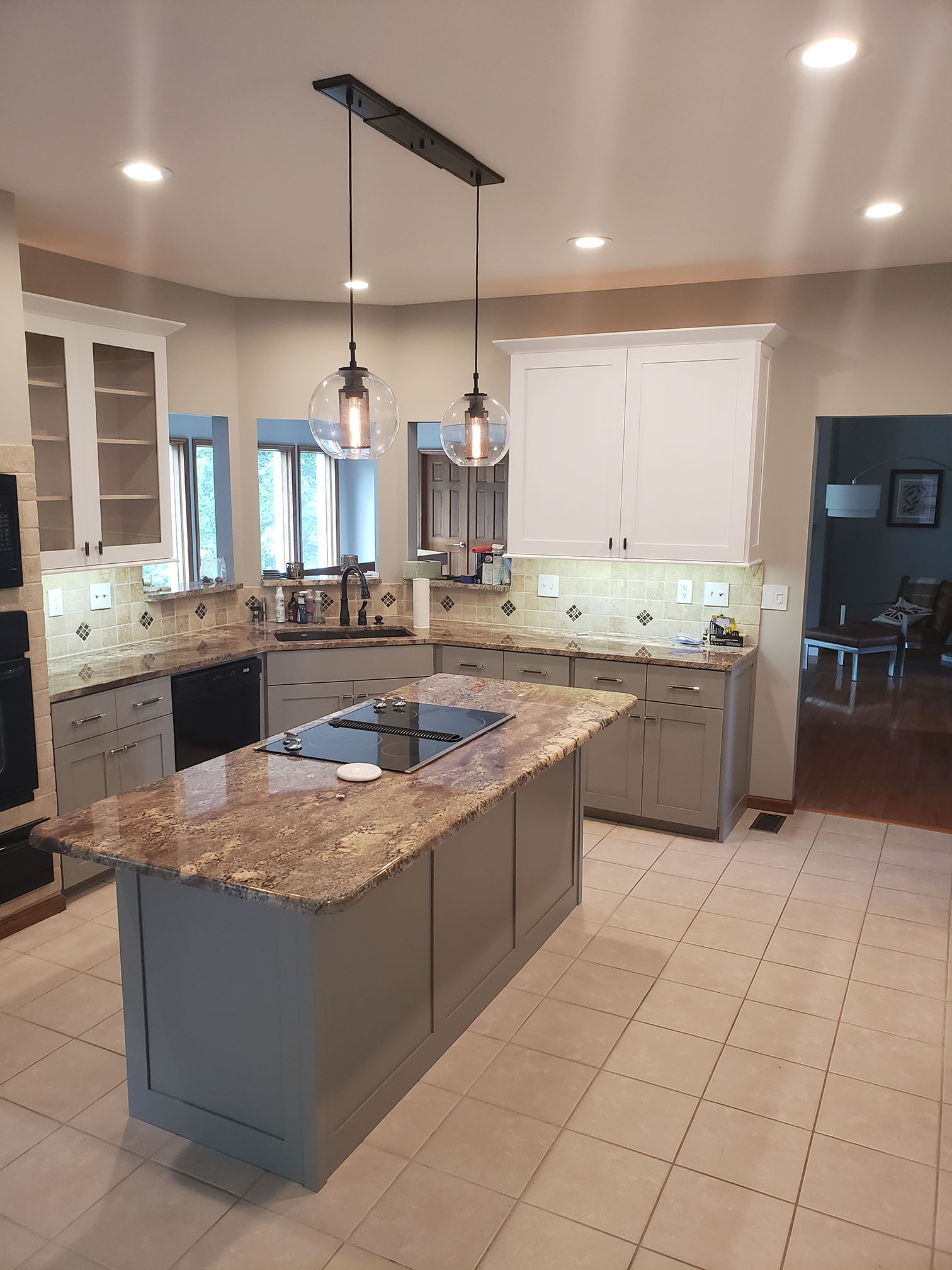 Dual-tone kitchen cabinetry with contrasting island - St. Louis custom cabinets